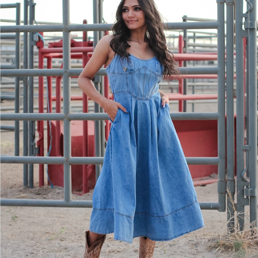 Denim western style dress with buckle straps. NWT